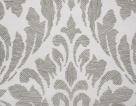 Dettaglio di un tessuto di una tenda da interni bianca ricamata in grigio